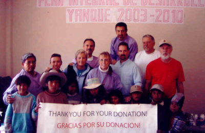 In front row are patients from the clinic in Yankue; in the second row: Dr. Willie, Kate, Barrie, Dr. Frank, and Dr. Curt; in the back row: Larry, Mario, and Mike.